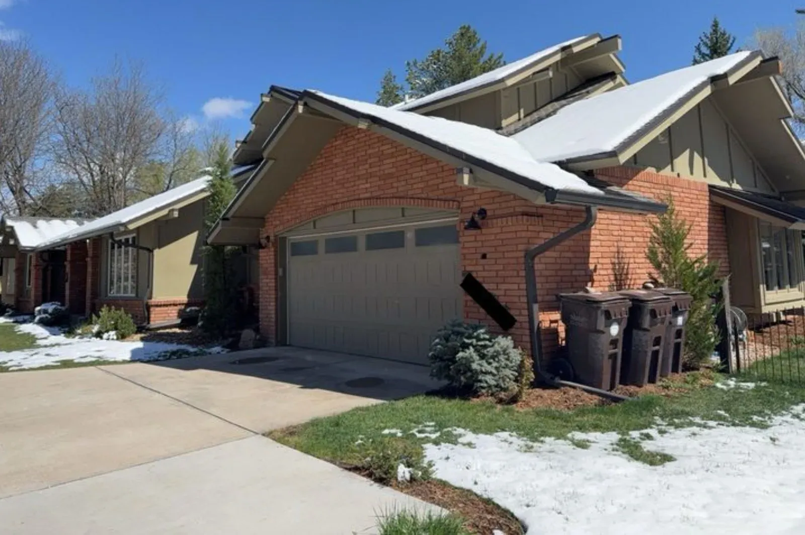Dated brick and siding exterior before remodel in Boulder