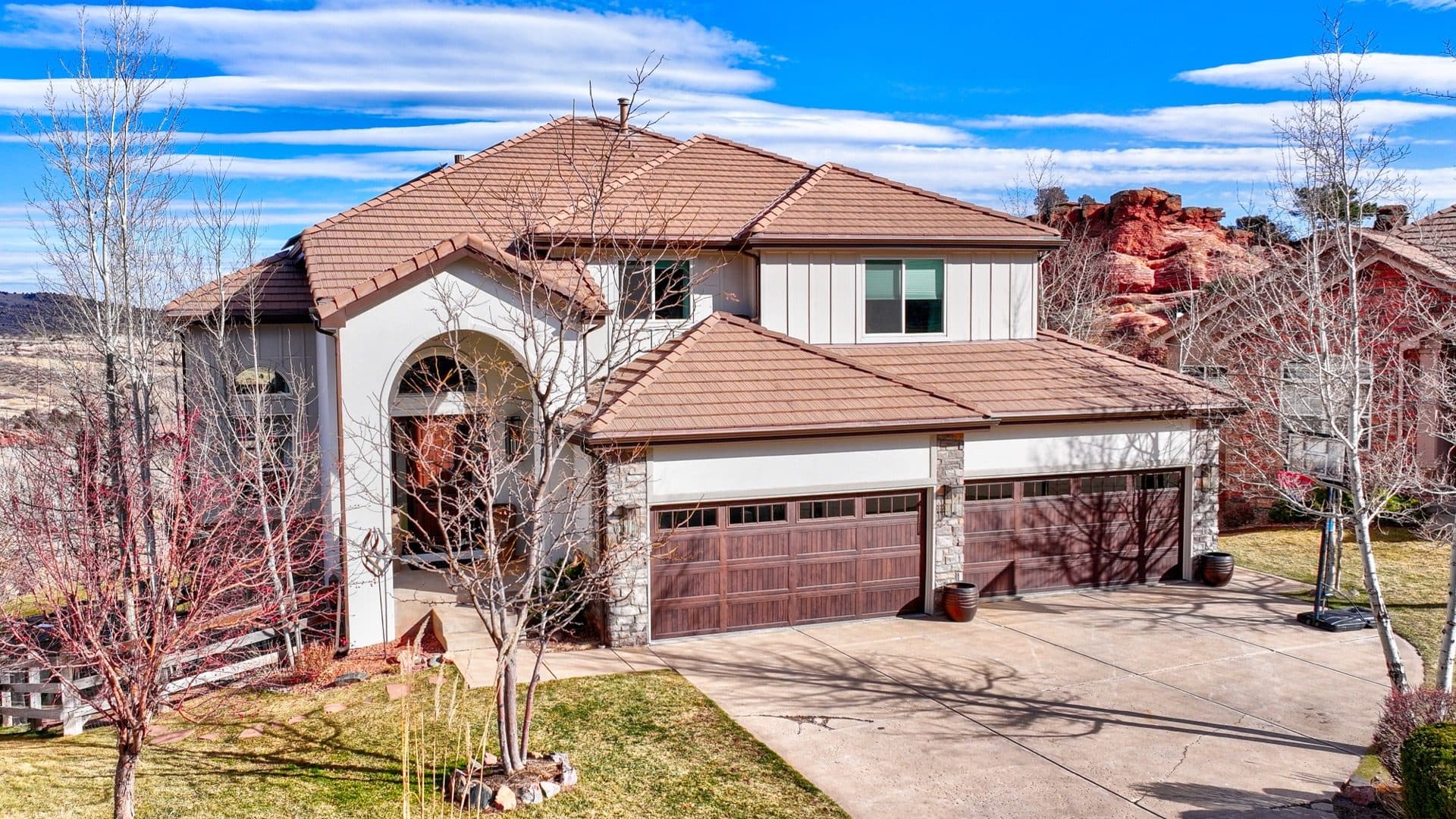 Aerial drone view of home with premium tile roofing in Morrison Colorado